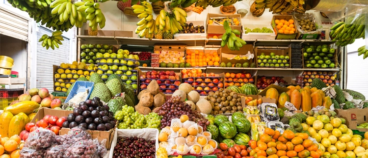 Vibrant fruit stall at Paloquemao market