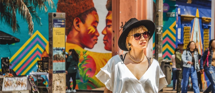 Traveler exploring street art in La Candelaria